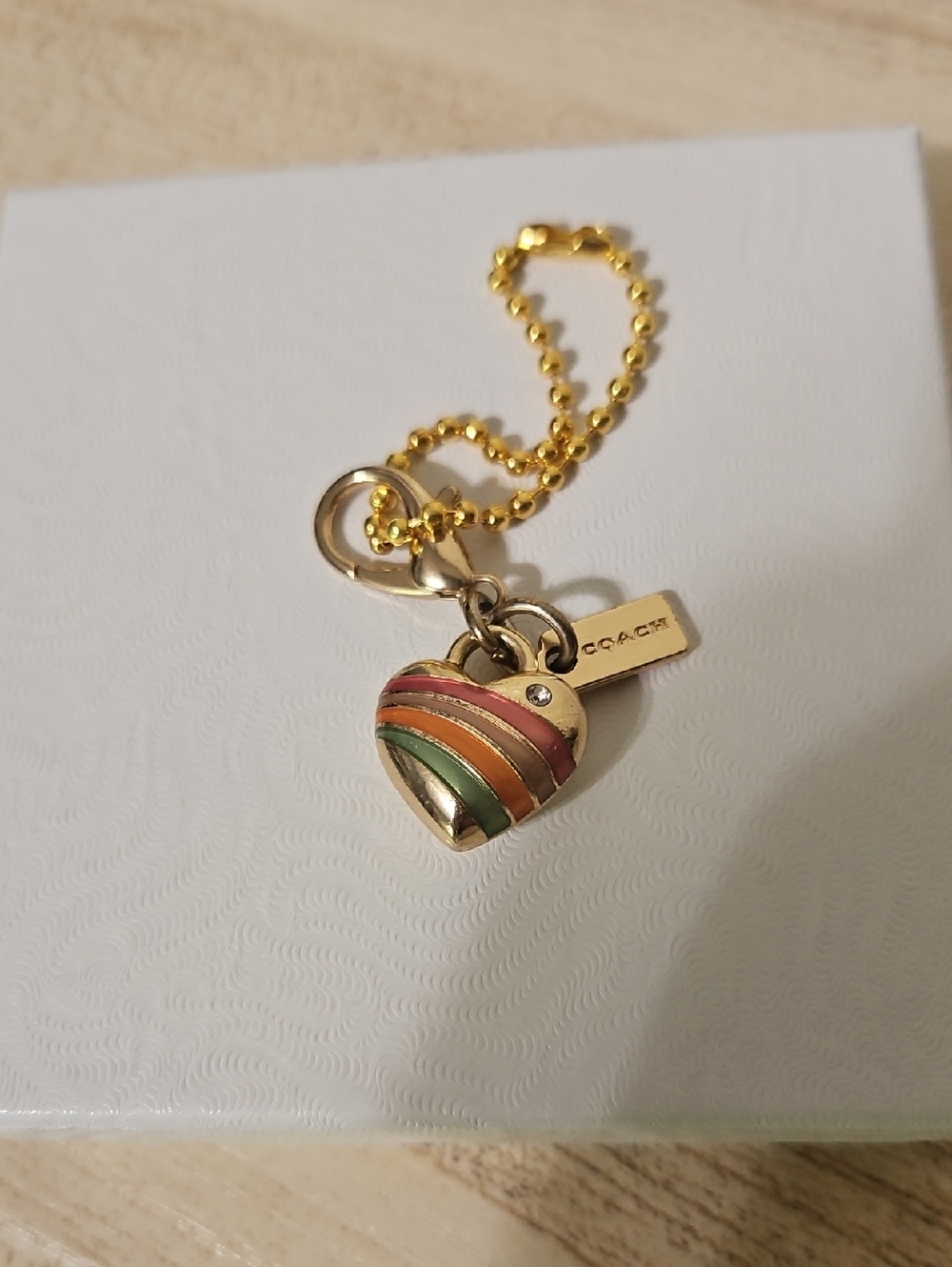 Coach EUC Gold Heart Charm Keychain with Rainbow Stripes